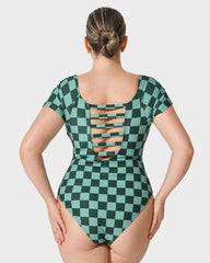 Traje de baño modesto de una pieza con mangas cortas y marca de verificación verde